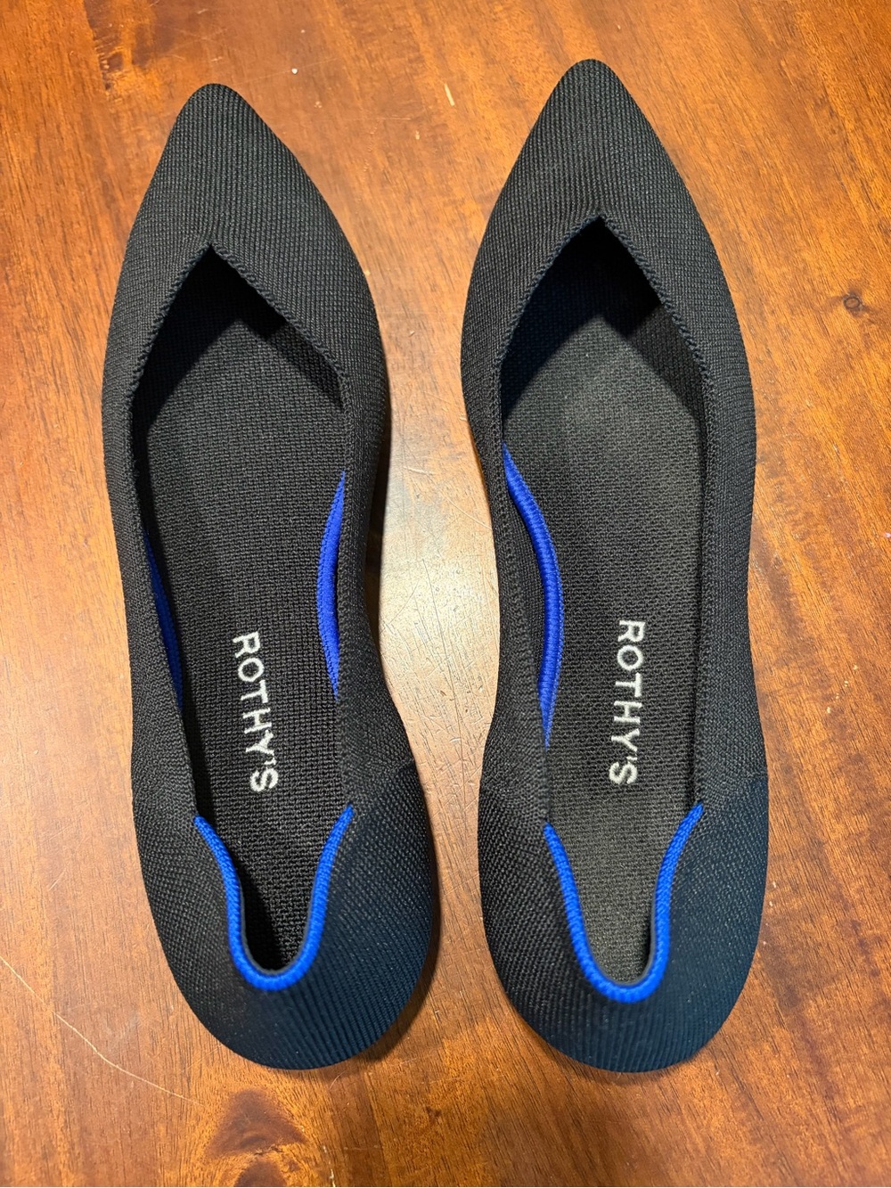 Rothy's Black Flats with Royal Blue Trim